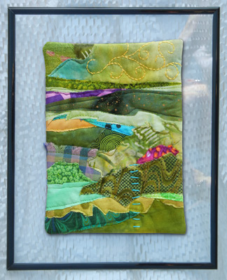 Image - green collage mounted on glass with frame