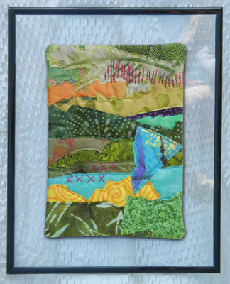 Image - collage mounted on clear glass and framed