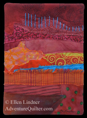 Image - red fabric collage with bright accents